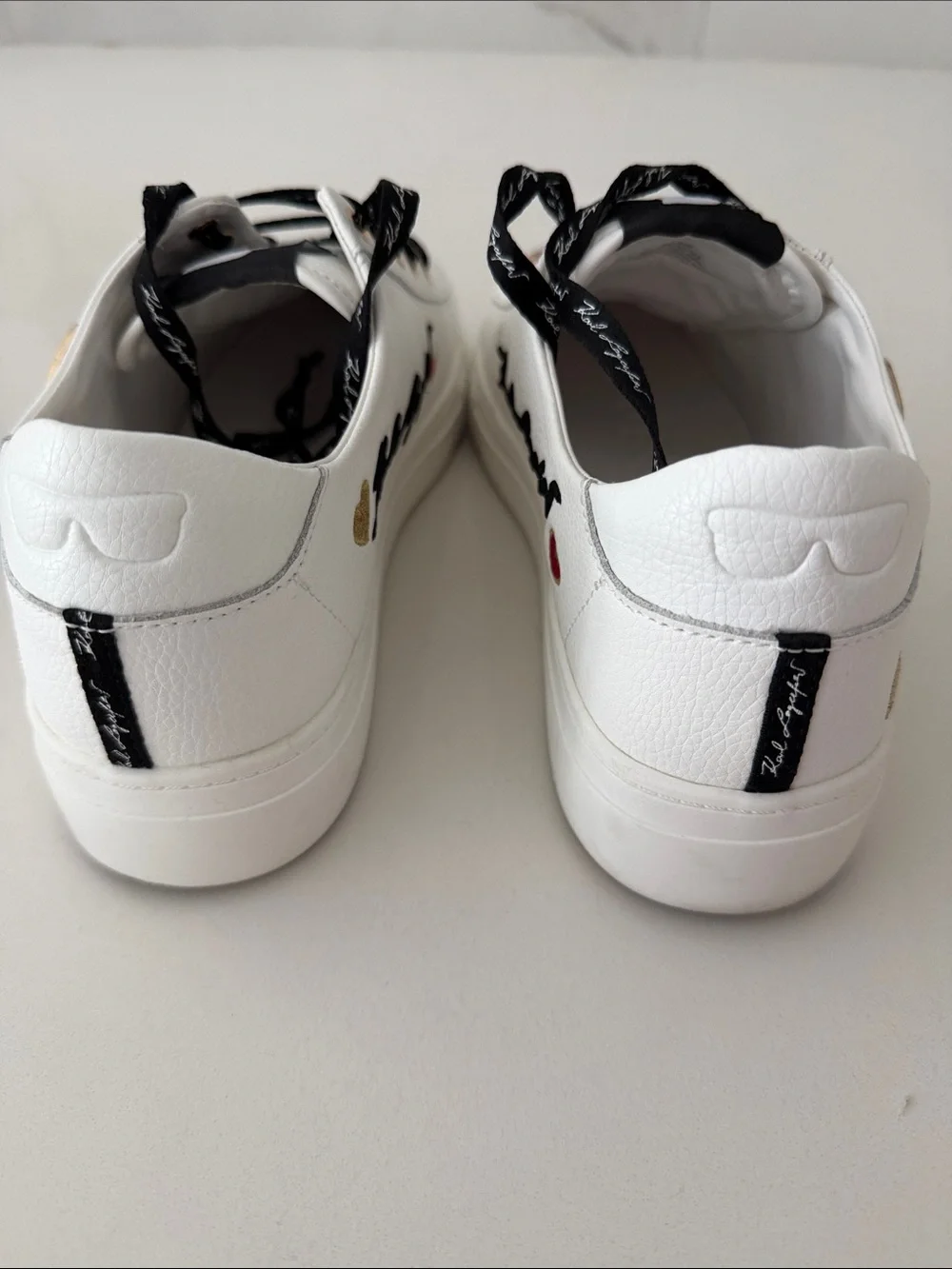 Karl Lagerfeld White Sneakers with Black Laces and Red Heart Accents